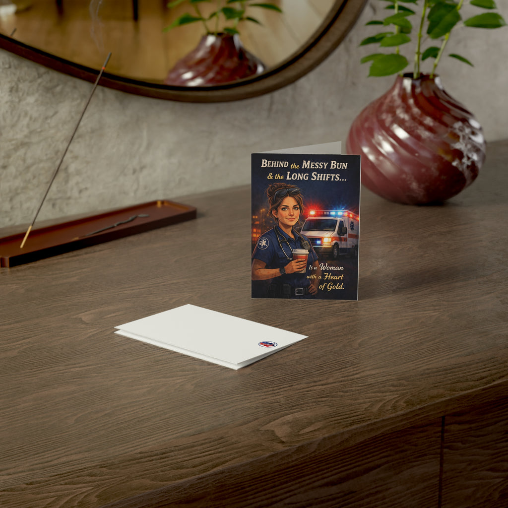 EMS Woman Greeting Card — "Behind the Messy Bun & Long Shifts... Is a Woman with a Heart of Gold"